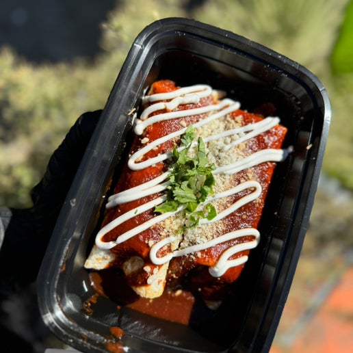 Red beef enchiladas topped with red sauce and shredded cheese, healthy meal prep from Fresno